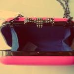 candy pink clutch bag